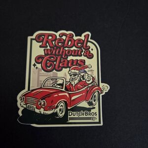 Dutch Bros "Rebel Without a Claus" Holiday Sticker - Red, Cream, Black